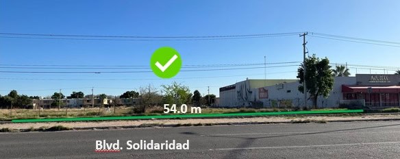 Amplia propiedad comercial en Blvd. Solidaridad, perfecta para inversión o desarrollo de negocios, con amplio frente de 54 metros en una zona estratégica de la ciudad.