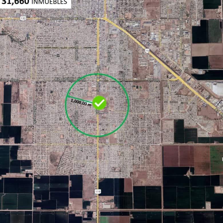 Amplia zona de terreno de 1,000 m² para desarrollo comercial en ubicación estratégica, rodeada de infraestructura y accesos principales, ideal para inversiones en bienes raíces comerciales.