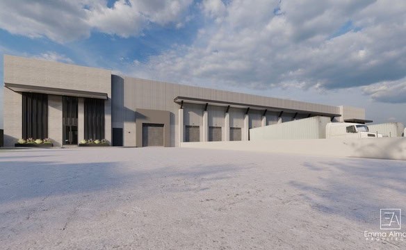 Alto: Edificio industrial de gran tamaño con amplios espacios para almacenamiento y logística, ubicado en una zona estratégica para bienes raíces comerciales.