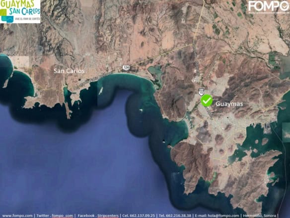 Vista satelital de Guaymas y San Carlos, Sonora, con detalles de acceso a zonas costeras y principales vías de comunicación para propiedades comerciales.